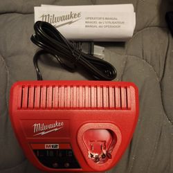 Milwaukee M12 Battery Charger – New w/ Manual