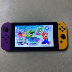 NINTENDO SWITCH with 125 SWITCH GAMES