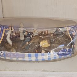Ratatouille figurine set (open-box, unused figures, distressed packaging)