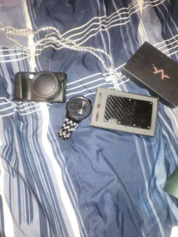 Jewelry camera and wallet