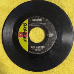 This item is a vintage 7-inch vinyl record, specifically a 45 RPM single titled "Detour" by Mel Carter, released on the Imperial label. 