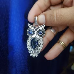 Silver Owl Pendant With Blue Topaz