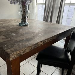 Sell As Set Of Heavy marble Table And Chairs ,and extra Table