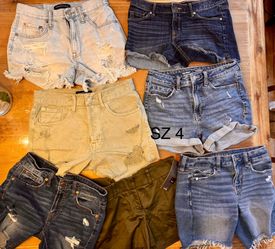 20 pairs of  Women’s shorts  13 pairs size 4 & 5 pairs of size 5 