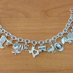 Bracelet With 14 Charm's Asking $40