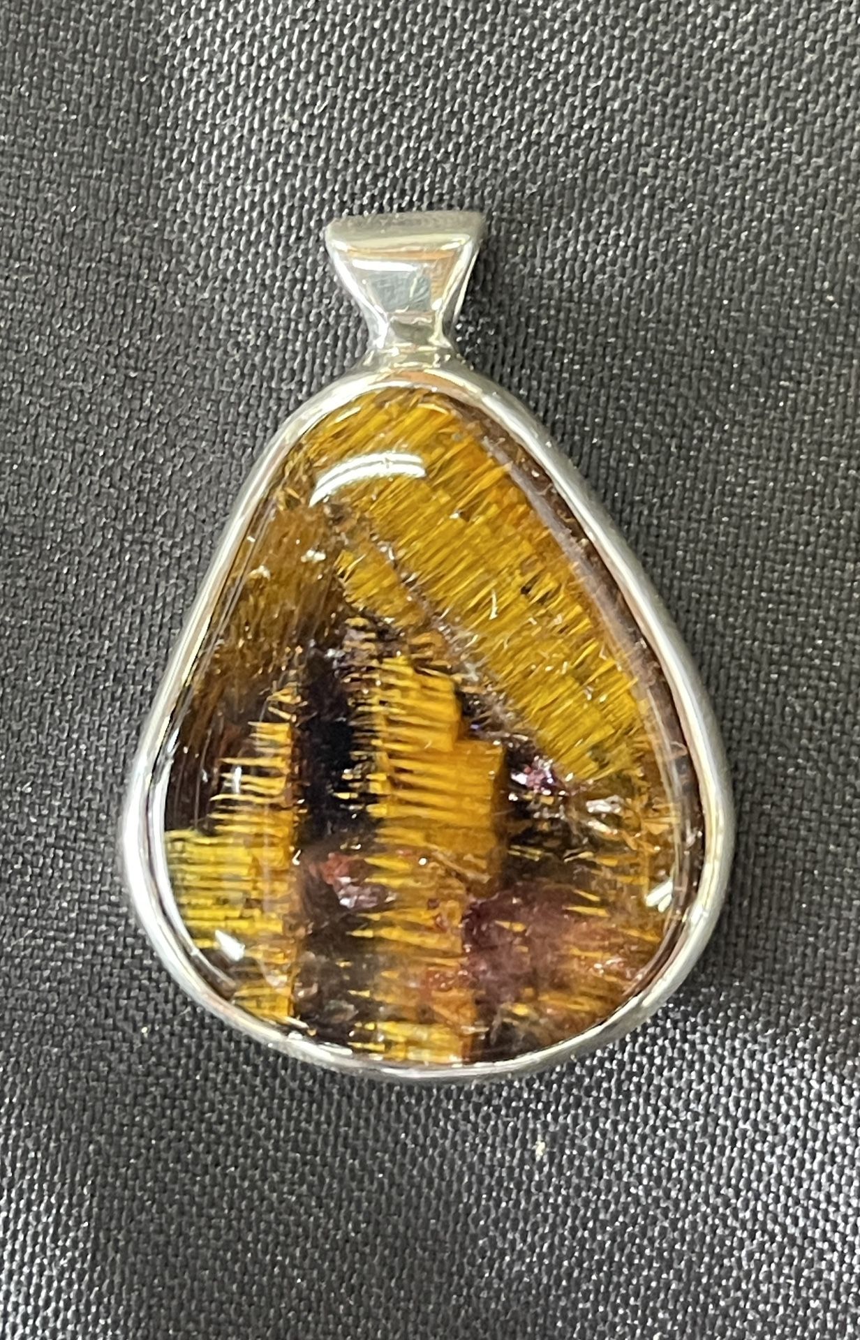 Spectacular Cacoxenite Quartz Pendant