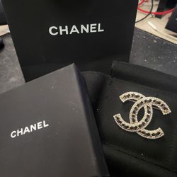 Chanel bags with Chanel earrings and Chanel brooches