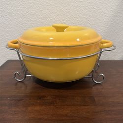 New round covered yellow casserole