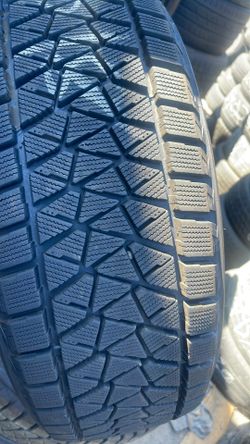 235-60-18 Bridgestone Pair Like New