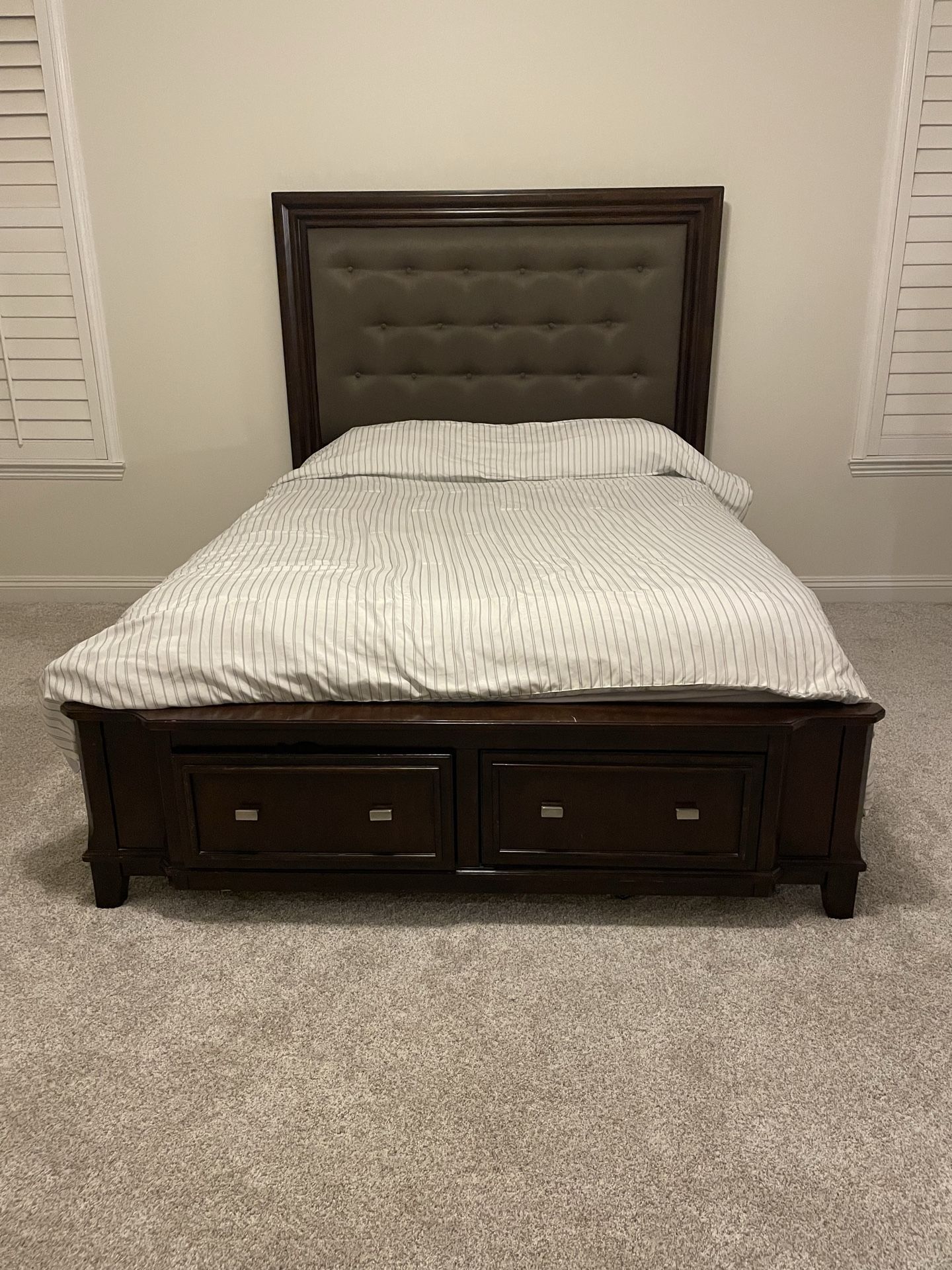 Queen size bed and tall dresser from Ashley furniture