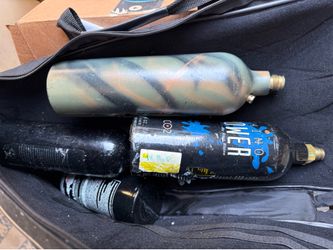 4 used pain gum tanks