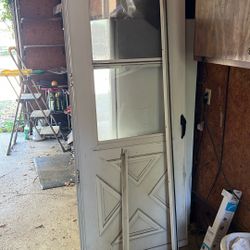 Storm Door With Sliding Screened Top Window 