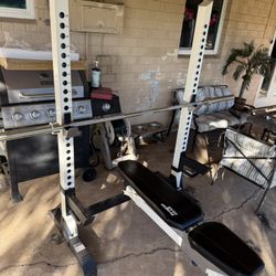 Olympic Bench w/ Olympic Bar, weight rack & 340 lbs in plates