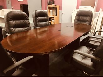 8 ft conference table veneer and 6 plush leather chairs