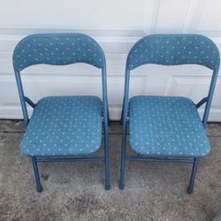 2 Folding Blue Cushioned Chairs