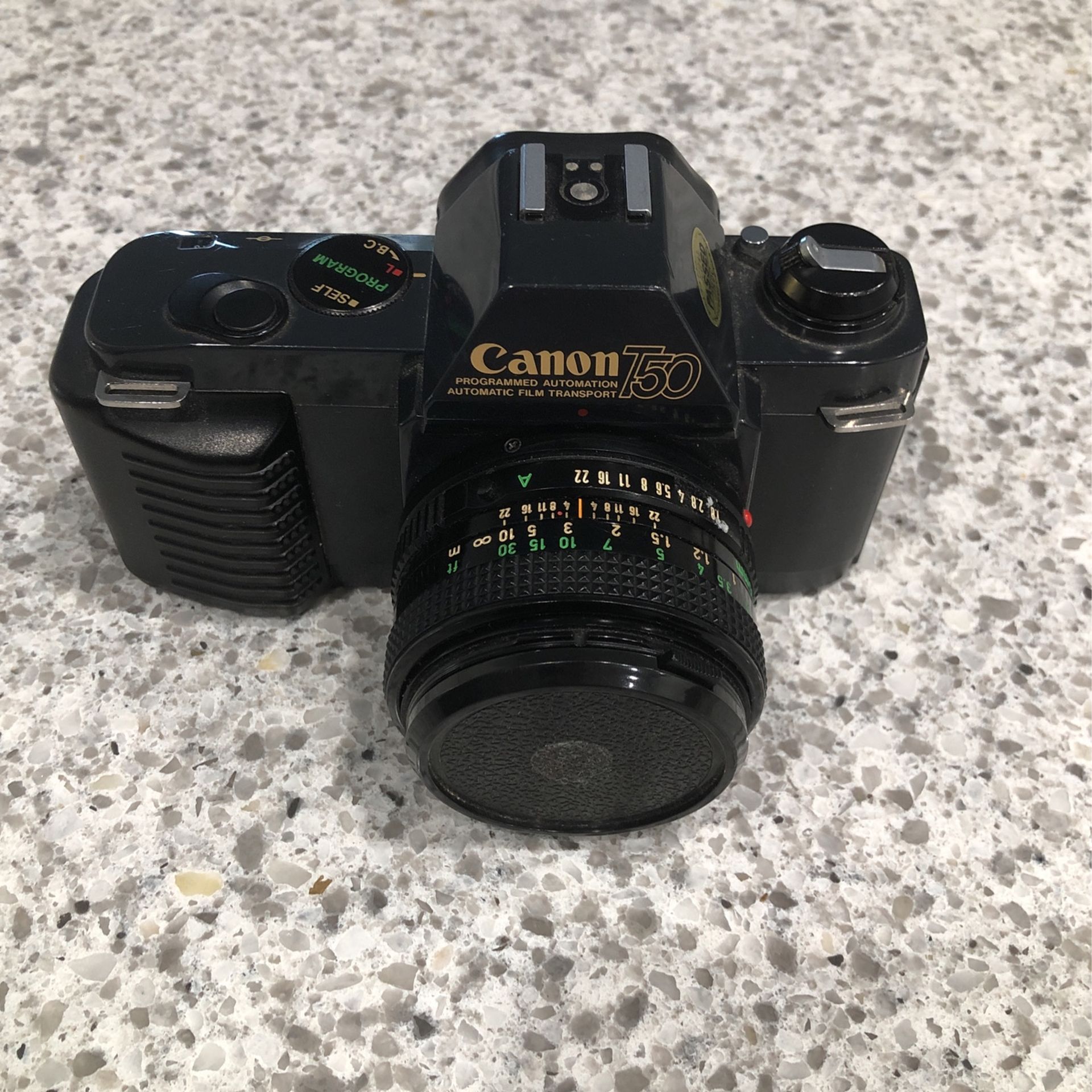 $25 1984 Canon T50 35mm camera and 80-200mm Extra Lens