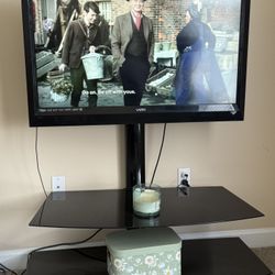 Tv, Stand , Roku Stick
