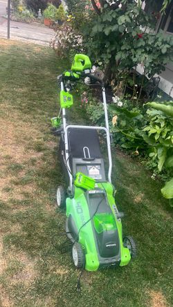 Green works lawnmower and weedeater Green works lawnmower and weedeater