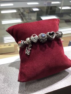 Pandora charm bracelet with charms