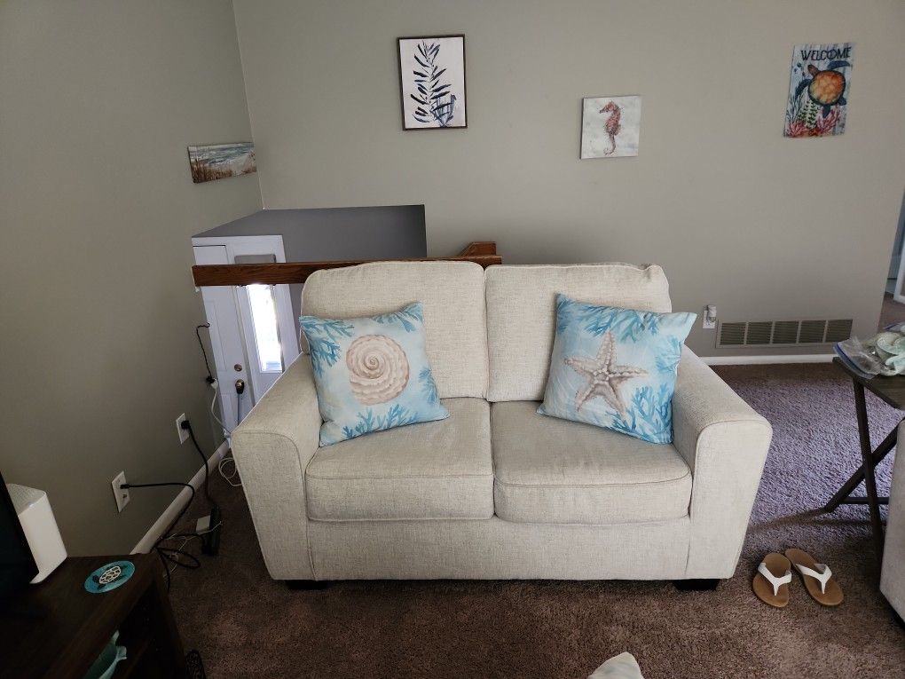 Love Seat With Cushions