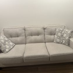 White Sofa With Cushions 