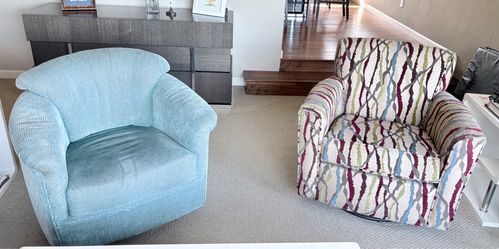 Two swivel armchairs