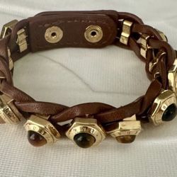 Henri Bendel Adjustable brown golden Leather Logo Snap Bracelet Approx 8 inches long Adjustable  Rare collectible