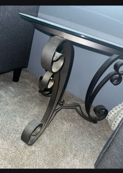 2 foot by 2 foot glass table
