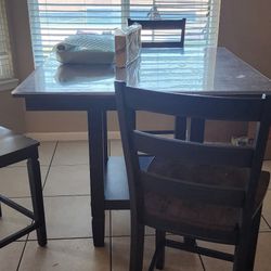 Beautiful bar height, table, and chairs