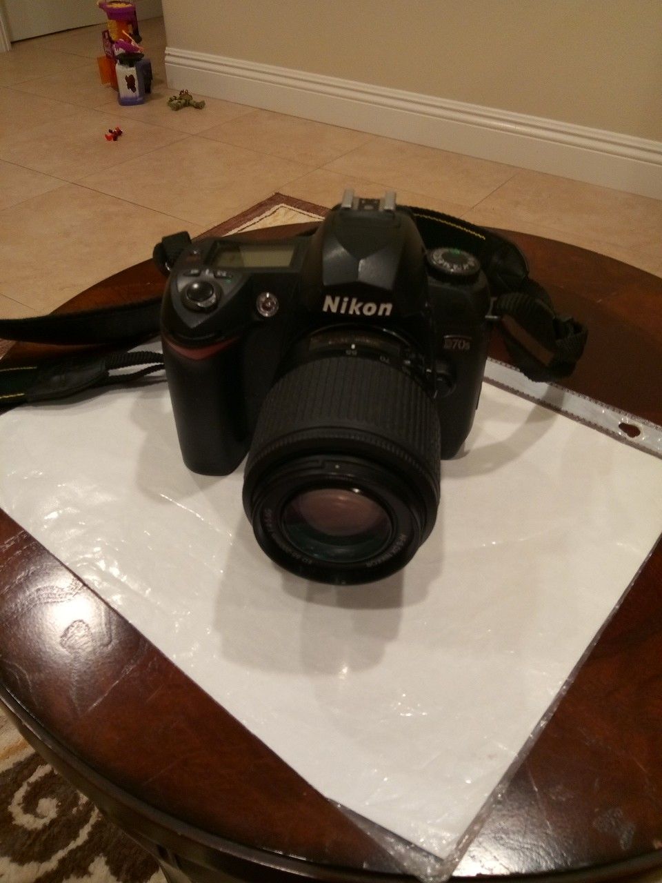 Nikon D70S camera with lens and flash card