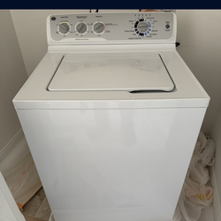 GE 3.8 cu. ft. stainless steel capacity washer with Water Hoses Very Clean and Perfect Working