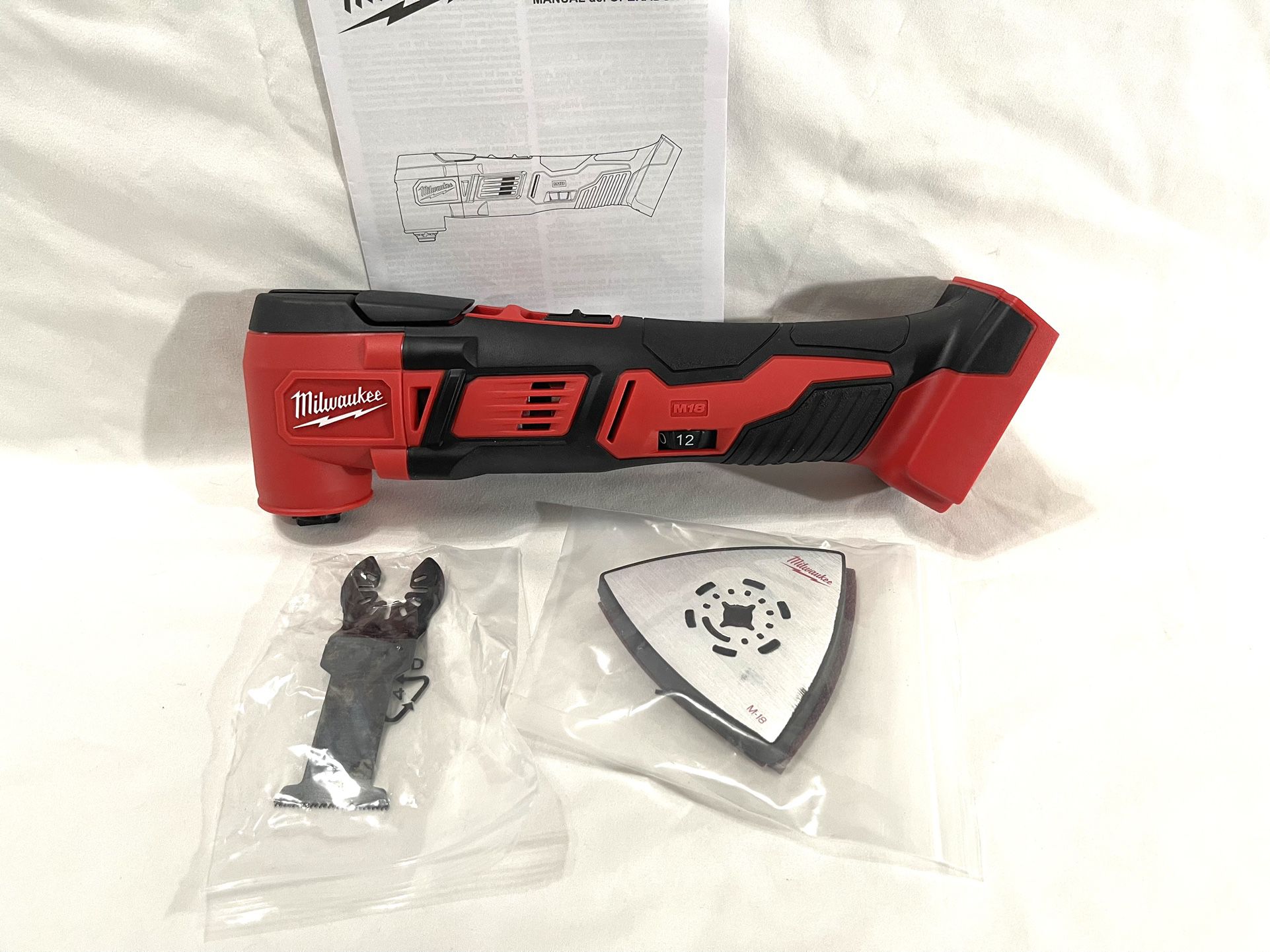 Brand New Milwaukee M18 Oscillating Multitool With Cut Off Accessory & sander accessory