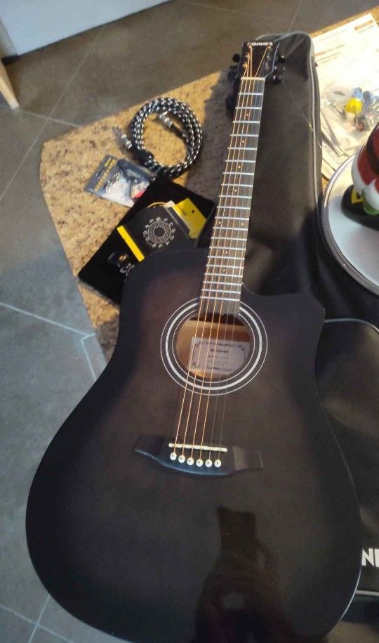 Electric Acoustic (Thin Profile) Guitar W/Amp, Chord, Extra Strings, Digital Guitar Tuner, Kapo, And Soft Case.