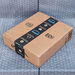 Clean small size cardboard box with foam packing peanuts for shipping moving or storage