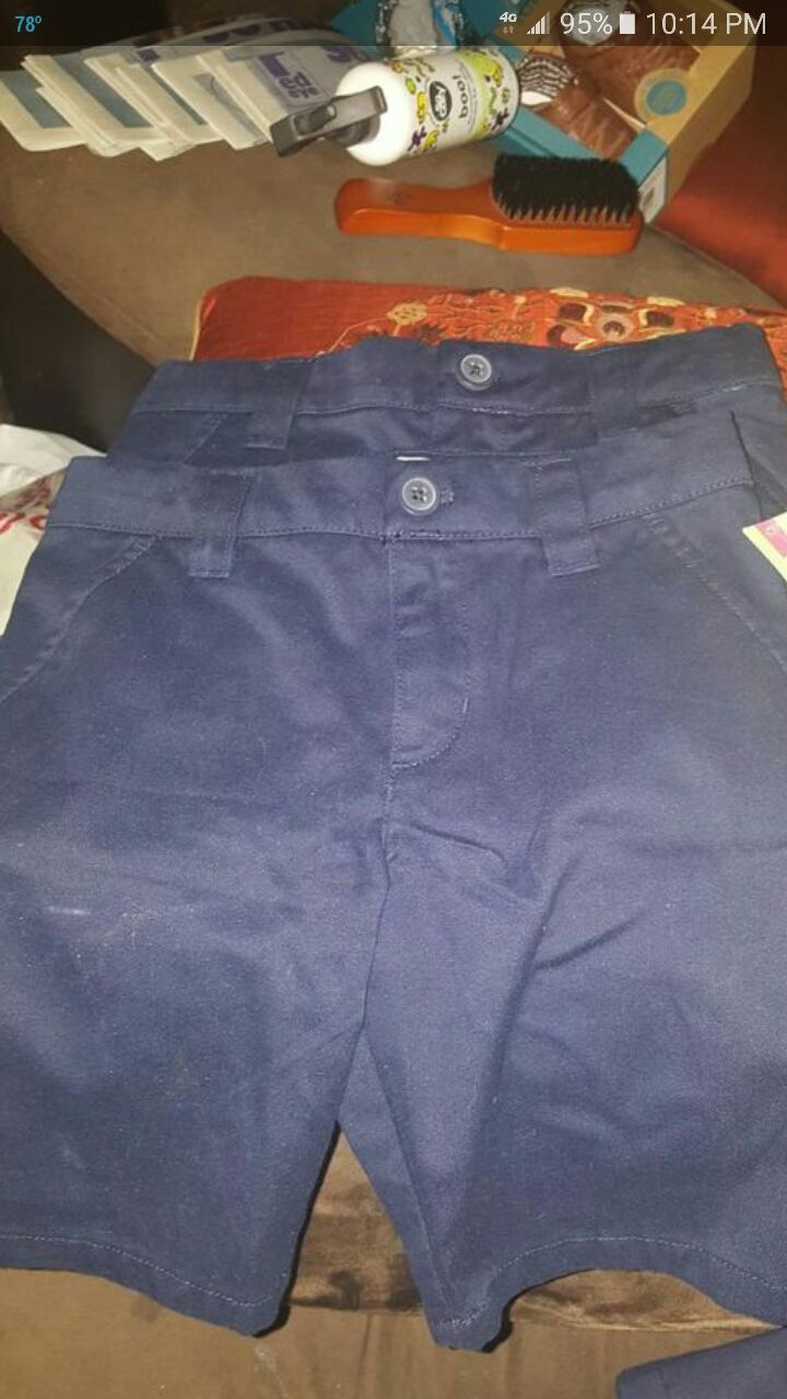 Blue uniform shorts and skirt