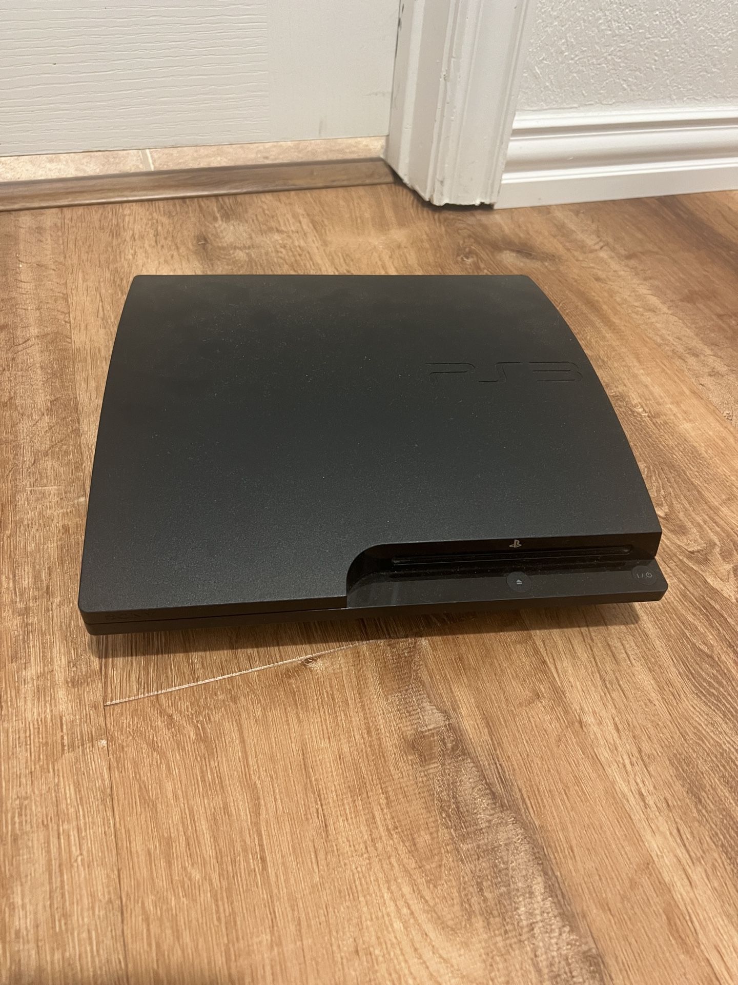 PS3 (Slim, 150GB) + 19 Games + 2 Controllers 