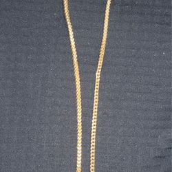 10kt gold necklace
 10kt gold religious pendant with clear and yellow diamonds 