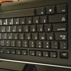 Computer Monitor And 3 Keyboards 