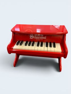 Schoenhut red mini piano