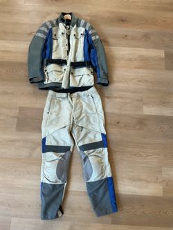 Motorcycle suit jacket pants vest gloves and helmets