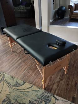 Massage table