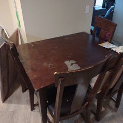 Dining Table And Four Chairs