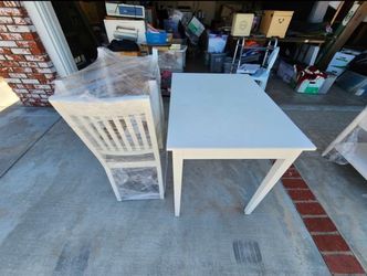 Living Spaces dining table and chairs