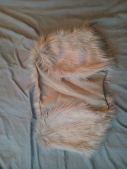 Fur Vest An Fur Moccasins.