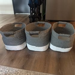 Grey and white storage bins