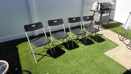 4 foldable chairs with metal frame