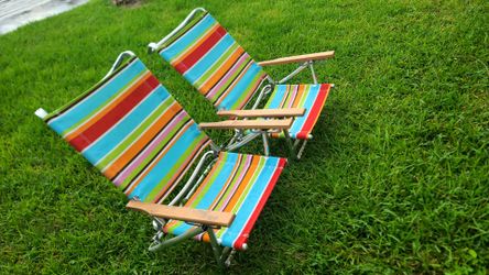 2 foldable chairs, lay flat ,adjustable positions, lightweight