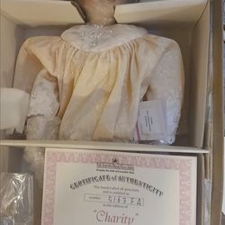 The Ashton-Drake Galleries, "Charity" porcelain doll
