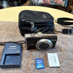 Canon PowerShot SX200 IS 12.1MP Digital Camera - Brown with battery, 2GB sd card, charger and bag. Tested. Working great.