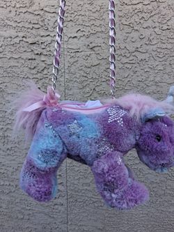 Unicorn fun purse and a sparkly purse